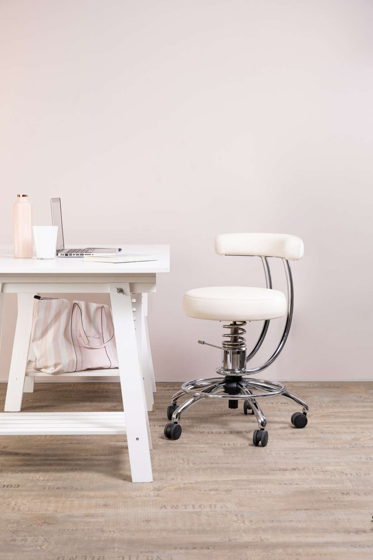 The Dent work chair stands next to the desk