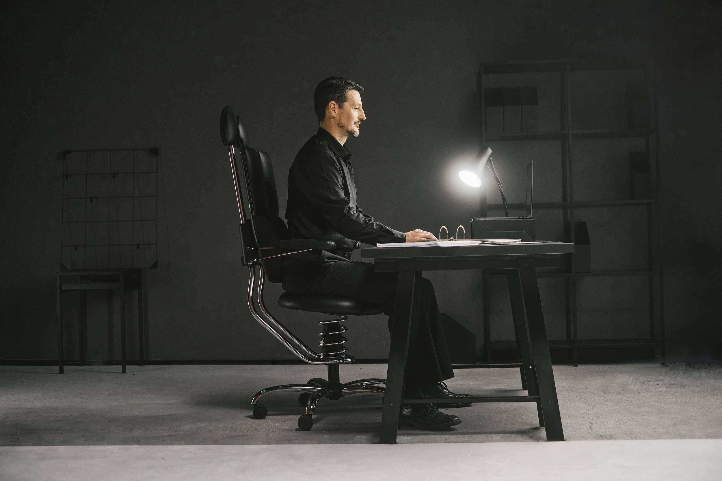 Pilot office chair in black painting of a man in the office
